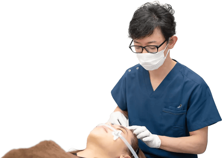 理事長が施術している様子